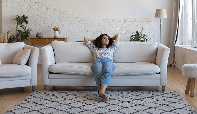 A person relaxing in a room with fresh air