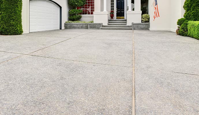 a clean, well-maintained concrete driveway