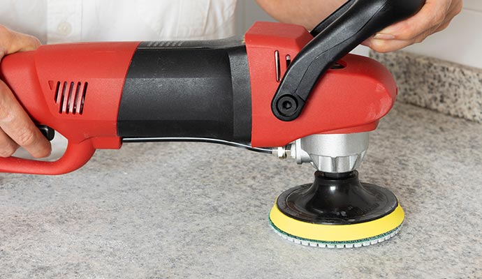 Restoring countertop using equipment